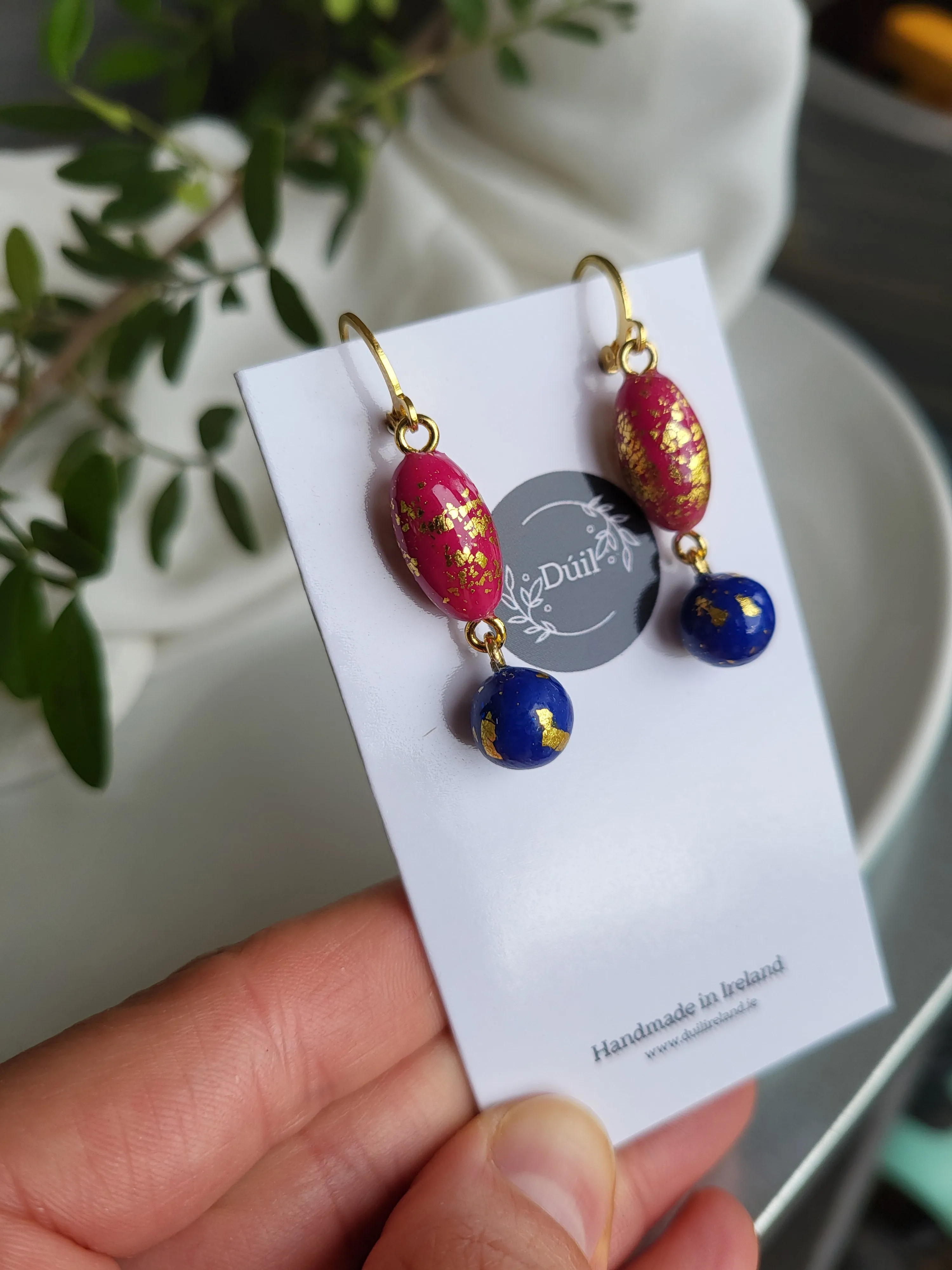 Pink and blue dangling earrings