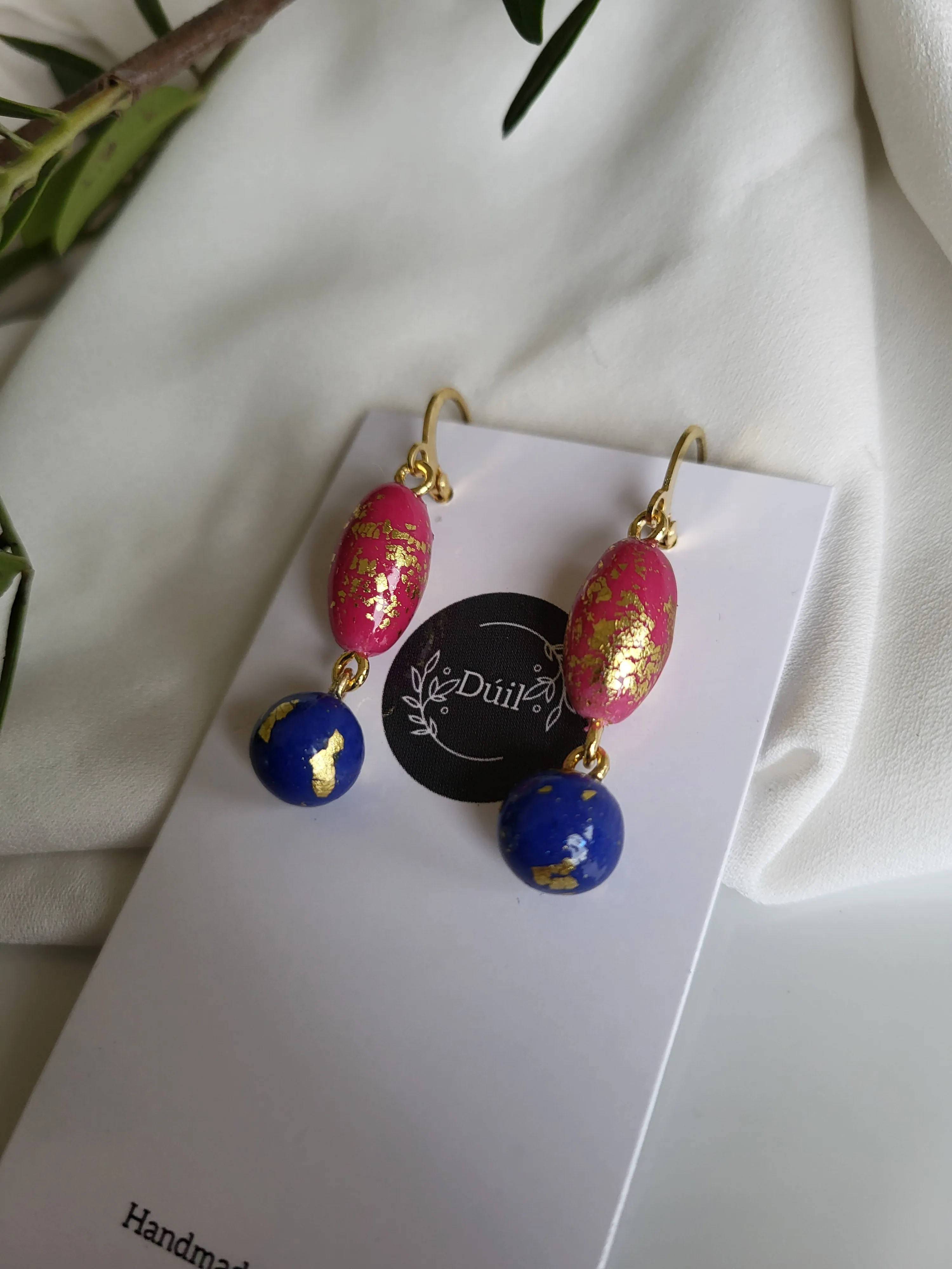 Pink and blue dangling earrings