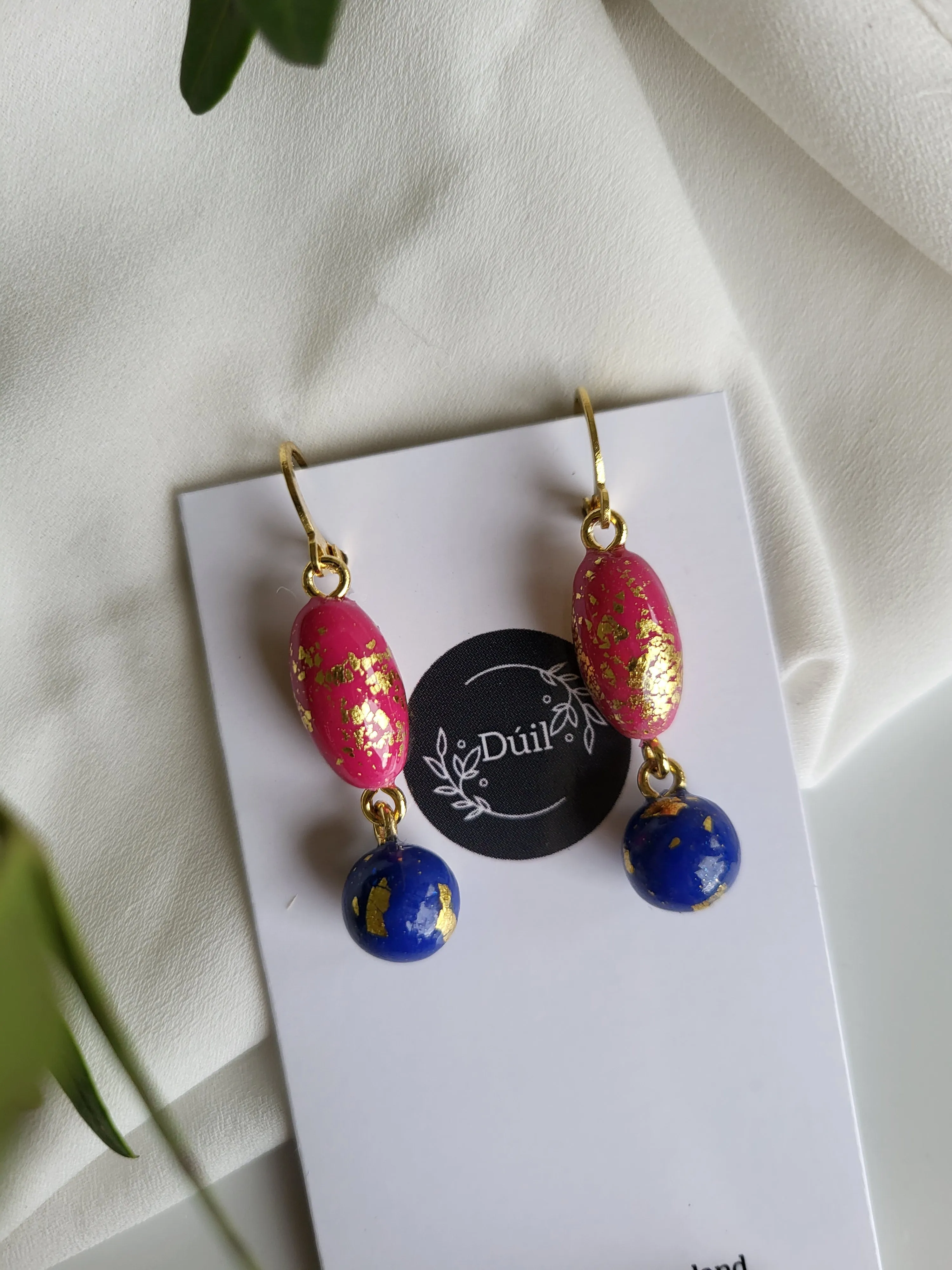 Pink and blue dangling earrings