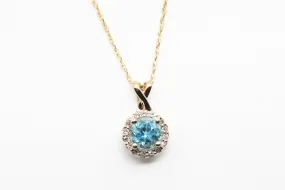 Yellow Gold Blue Topaz Pendant with Diamond Halo